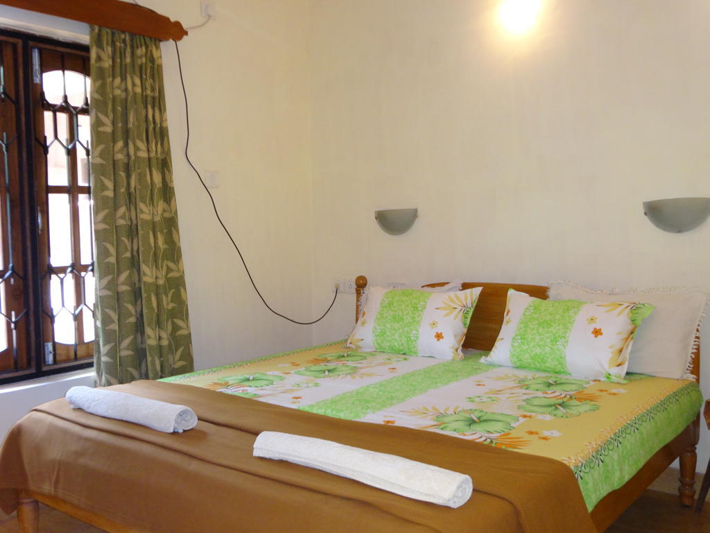 Pinto Guest House Candolim Quarto foto