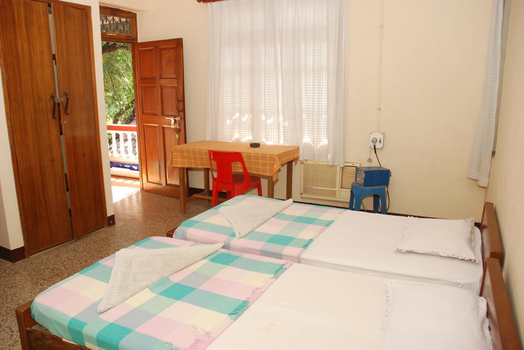 Pinto Guest House Candolim Quarto foto